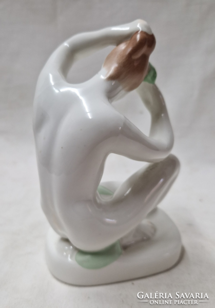 Old Aquincum kneeling female nude porcelain figure in flawless condition