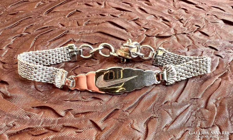 Engraved metal strap nike bracelet