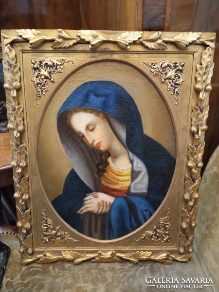 Antique oil painting depicting Mary