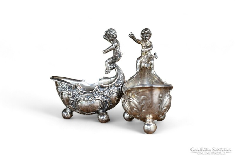 A pair of rare baroque silver figural spice holders