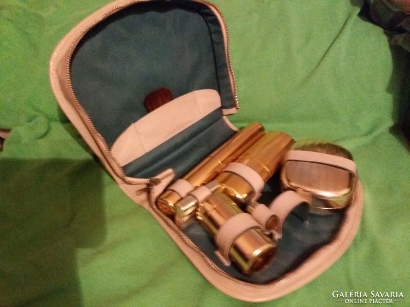 Old traveling leather gilded toilet / toilet set as shown in the pictures