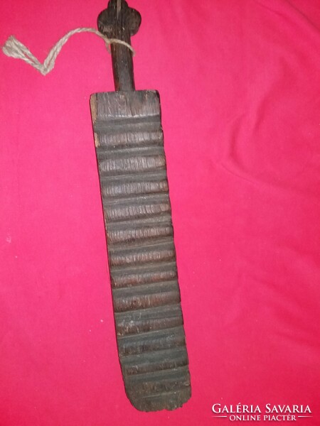 Antique marked carved hardwood washboard used for washing, as shown in the pictures