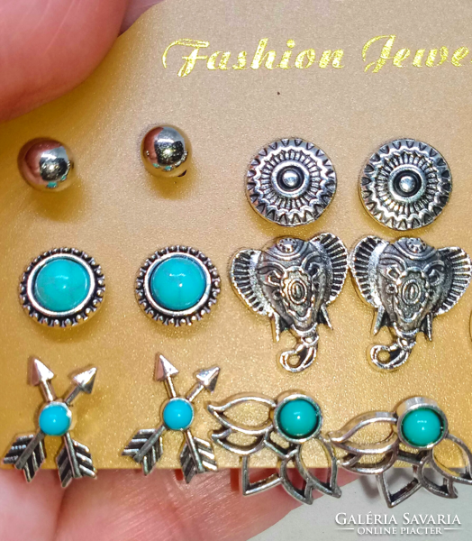 9 Pair of Tibetan silver earrings set, carved or with turquoise stones 107