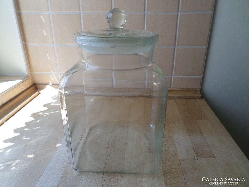 Old larger maggi glass storage with glass top