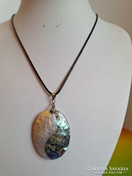 Two-color abalone shell pendant on leather thread