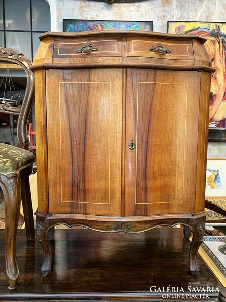 Honey-colored small cabinet with 2 drawers
