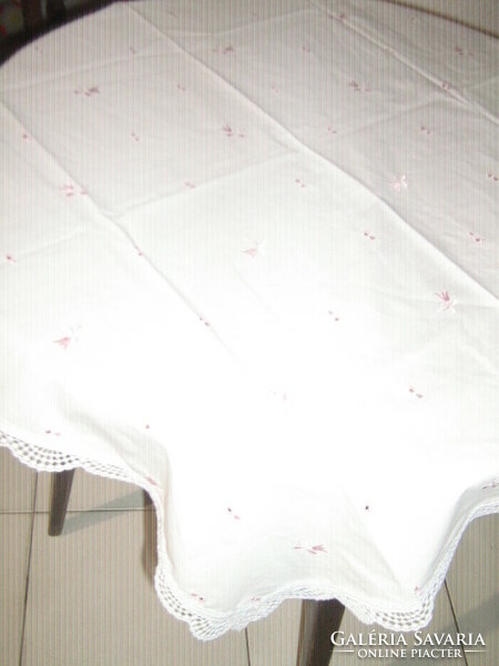 Madeira tablecloth with beautiful lacy edges and pink tulips