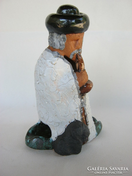 Pipe-smoking shepherd with Puli dog, Hungarian applied art ceramics