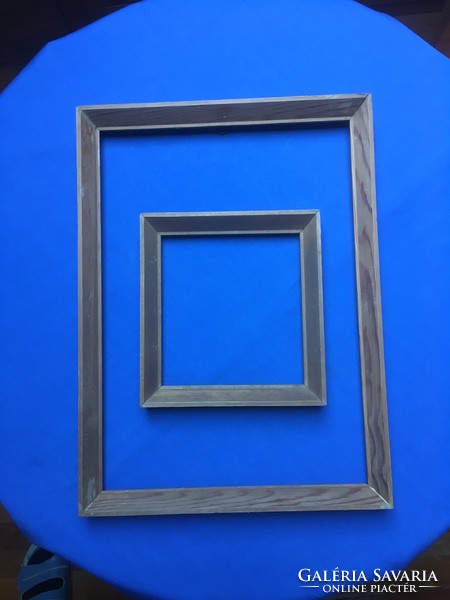 Two used wooden frames