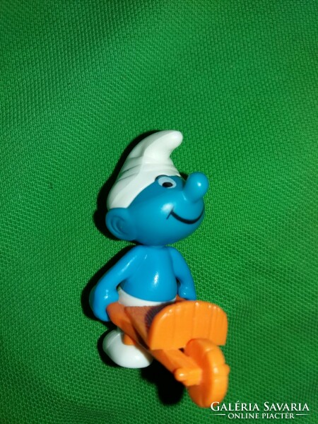 Plastic smurf peyo wheelbarrow hoops gnome figure in good condition according to the pictures