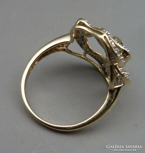 Rengeteg szikrázó  0.41ct gyémánttal 14 kr.arany gyűrű.Igazolással