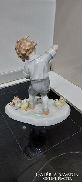 Porcelain statue of a German boy playing the violin