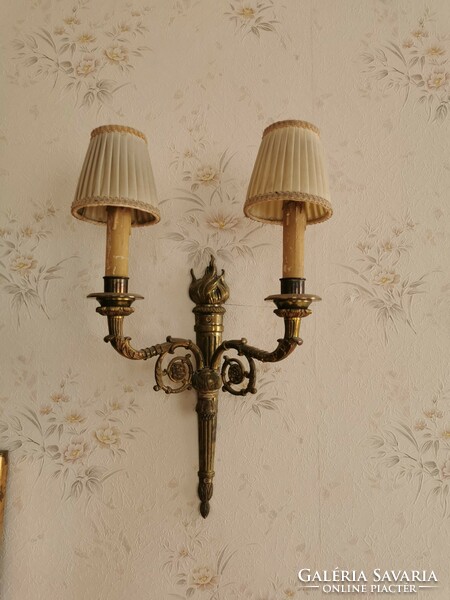 A pair of copper wall brackets