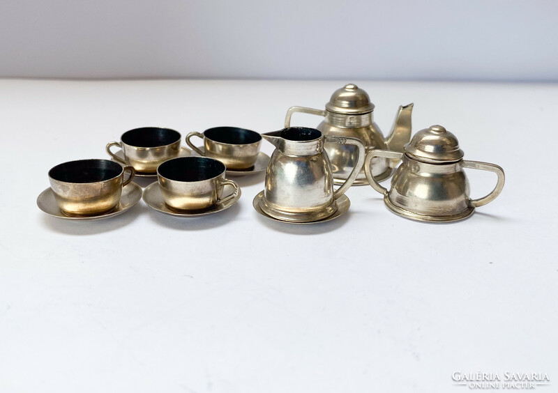 Old, miniature silver children's tea set.