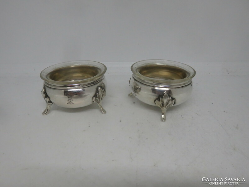 A pair of art-deco silver spice holders with original glass inserts