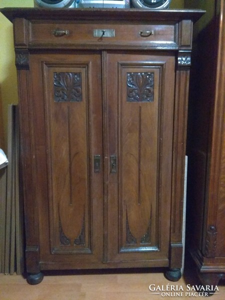 Carved eclectic cabinet