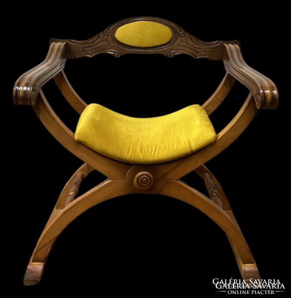 Antique style upholstered Savonarola armchair