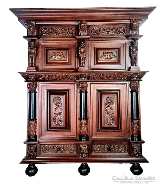Richly carved renaissance style cabinet