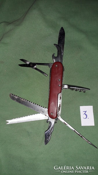 Old steel Swiss Army knife with vinyl handle multifunctional knife according to the pictures 3.