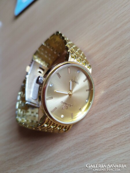 Orlando wristwatch, metal buckle, gold color. With a new battery, it works.
