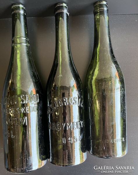 Inscribed old rare beer bottles.
