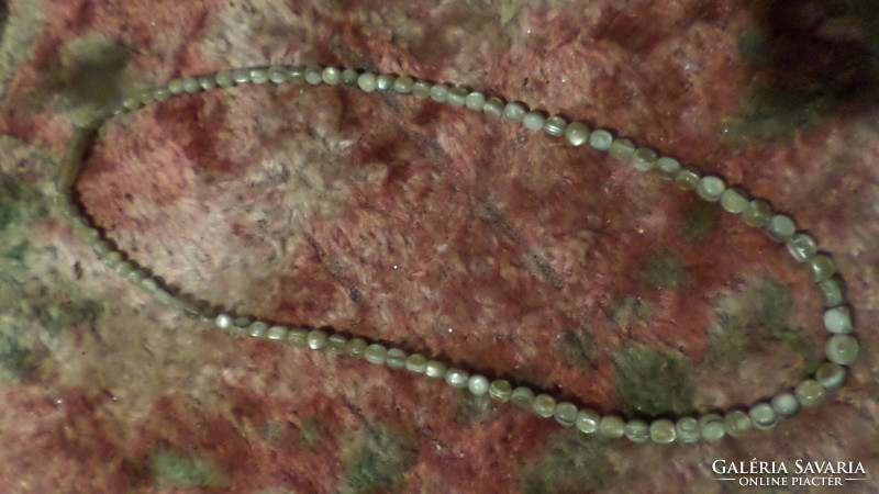 45 cm, smaller, mixed color necklace made of shell pearls.