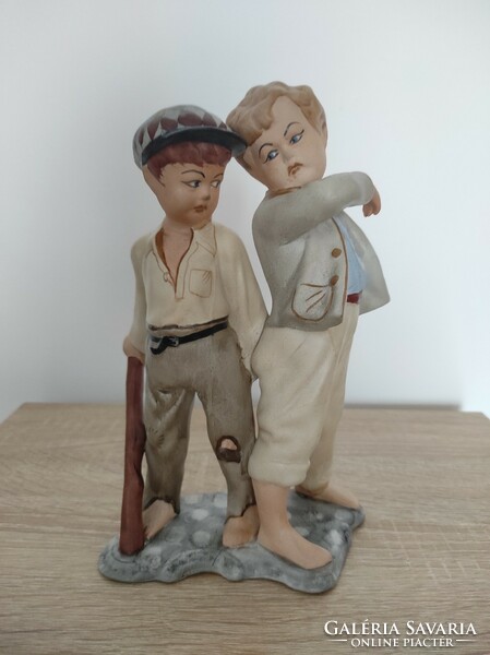 Biscuit porcelain depicting two boys