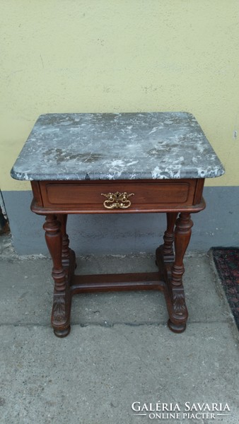 Table with marble top drawers