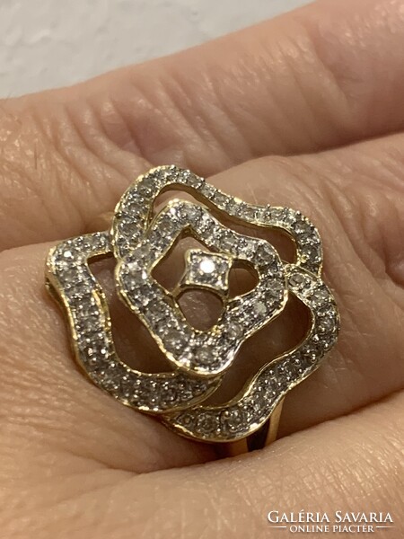 Rengeteg szikrázó  0.41ct gyémánttal 14 kr.arany gyűrű.Igazolással