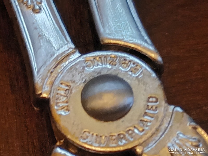 Ezüstözött tortacsipesz