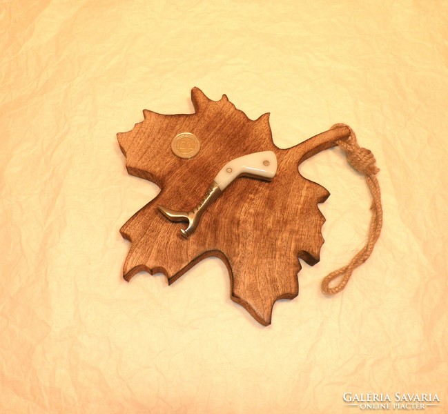 Old bottle opener, from a collection. Knife, cleaver, dagger, razor.