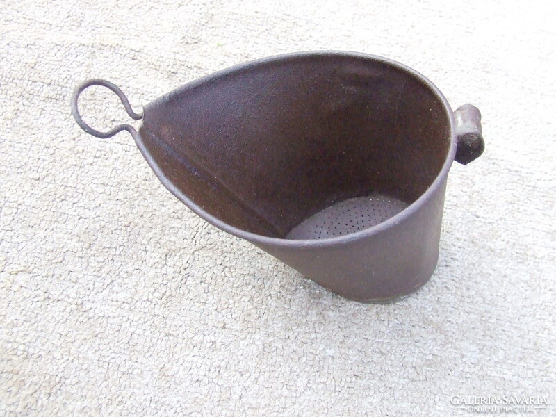 Old kitchen utensil tin milk strainer