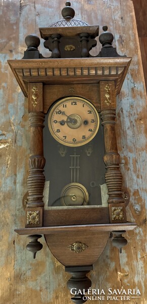 Old German wall clock with copper inlay