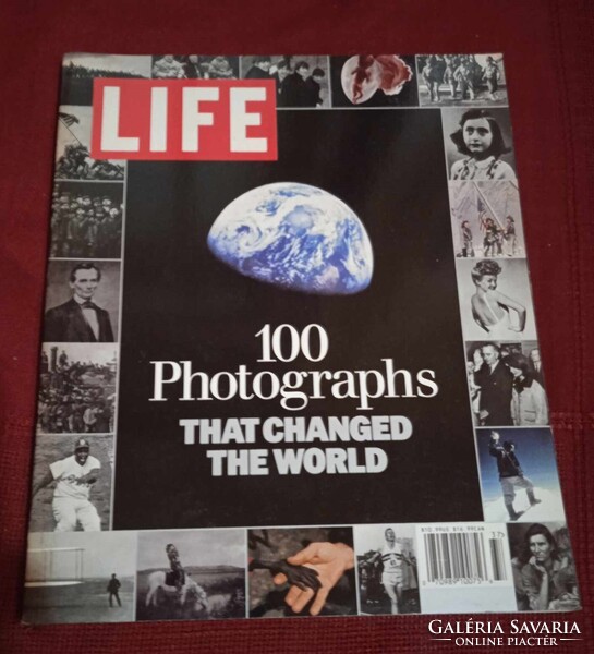 176 page like new paperback book 100 Photographs That changed the world Volume 5 printed in 2003