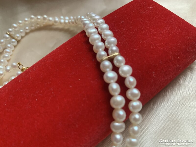 Gyémánt kapocs arany tagokkal dupla soros gyöngy nyakék.Igazolással