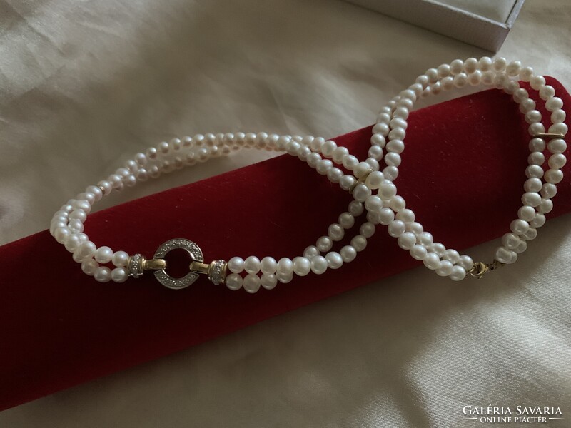 Gyémánt kapocs arany tagokkal dupla soros gyöngy nyakék.Igazolással