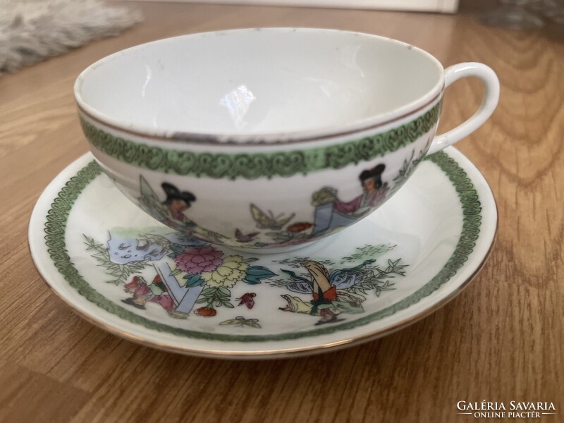 Beautiful collector's fine thin porcelain Chinese scene tea cup with saucer