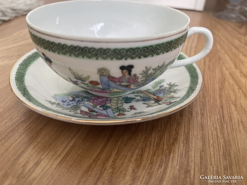 Beautiful collector's fine thin porcelain Chinese scene tea cup with saucer