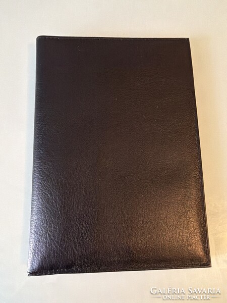 Large genuine leather wallet, unused, in its original box.