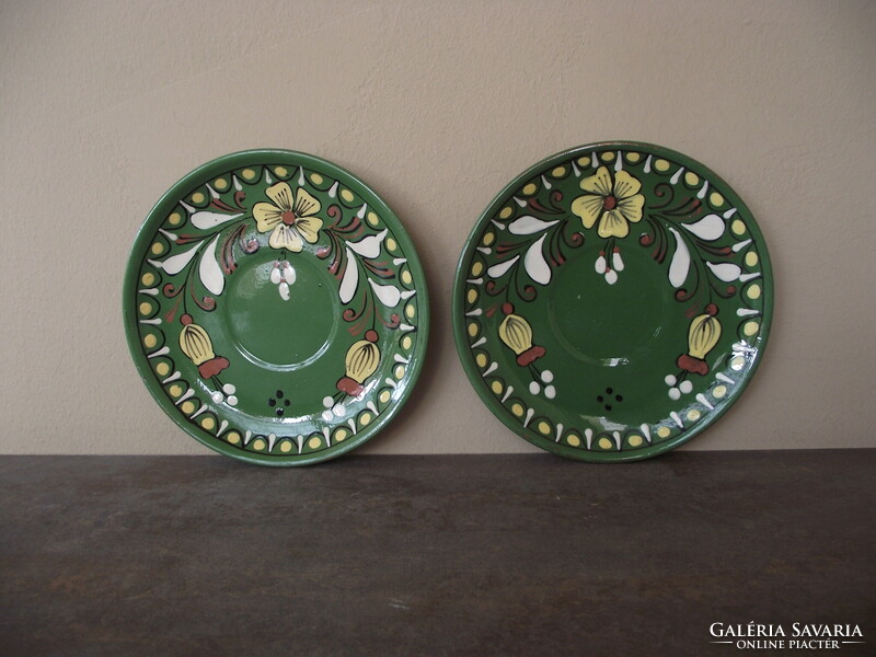 Green folk art ceramic wall plate pair