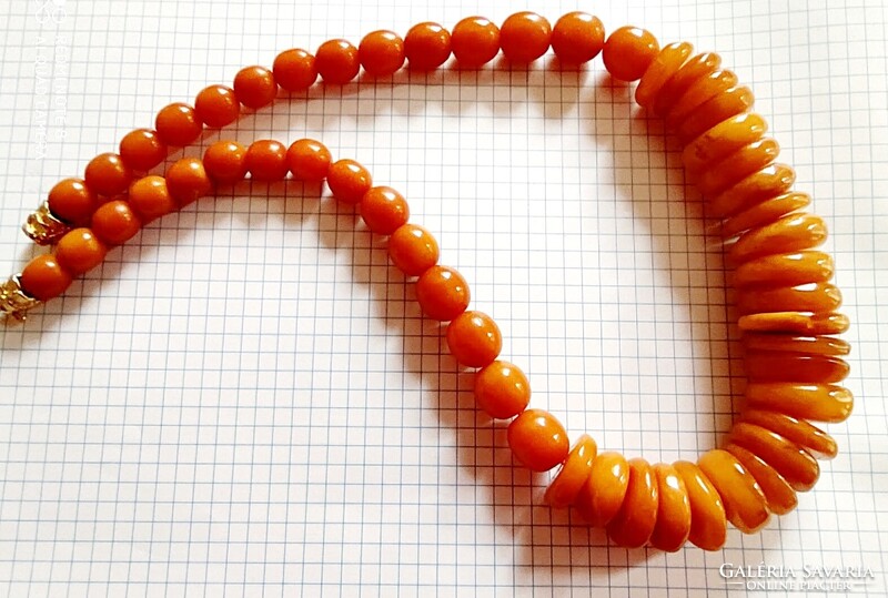 Antique necklace made of natural honey amber. Weight - 105 grams!