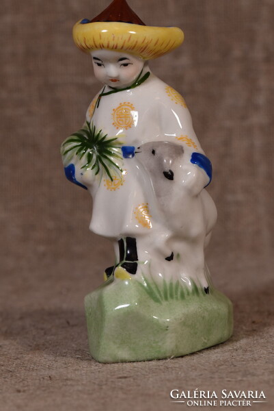 Chinese porcelain boy with goat kid in national costume figure from the 1960s