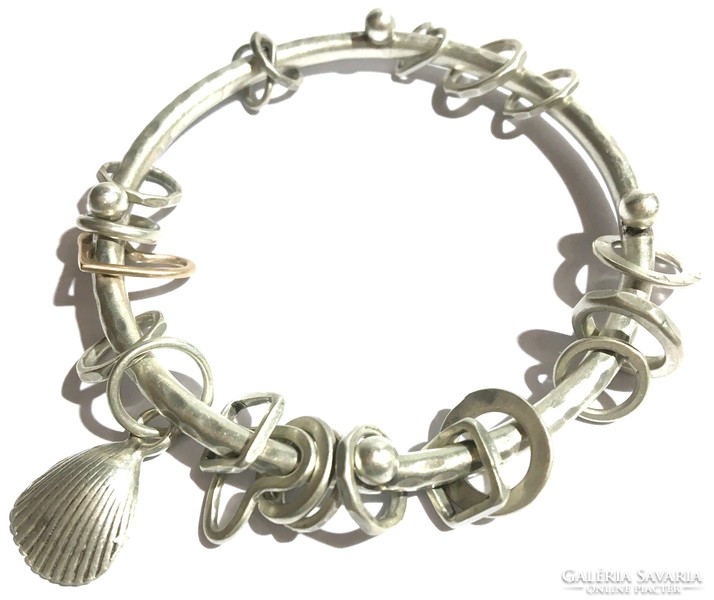 Silver Artisan Bracelet with Numerous Sliding Charms and Dangles